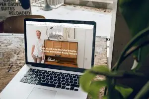 computer screen on top of brown wooden table