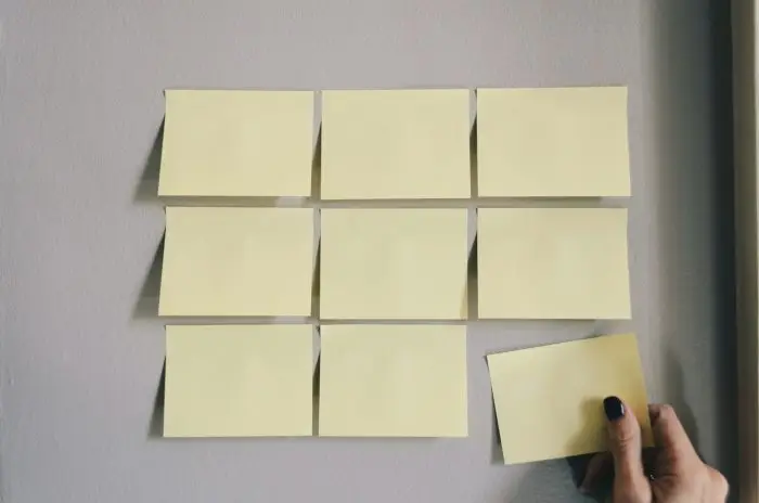 Yellow sticky notes on wall