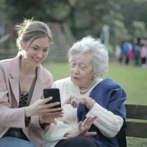 Female relatives sitting on wooden bench