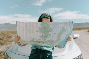 Woman Looking At a Map