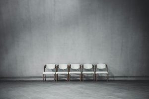 wooden chairs on gray floor