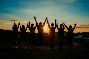 group of friends at sunset