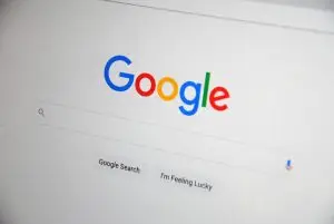 Close-up of the Google homepage on screen