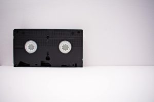 Black VHS tape on a white background