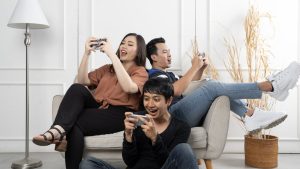 Three friends video chat on smartphones
