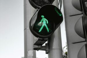 Close-up of a green walk traffic signal