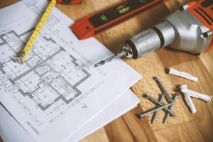 Close-up of construction blueprint with tools
