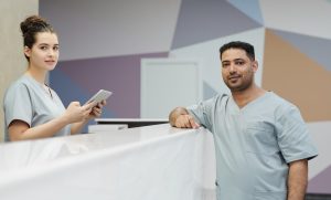 Medical staff members in scrubs
