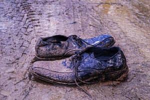 muddy dress shoes