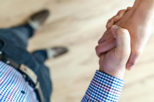 Close-up of a handshake between two people